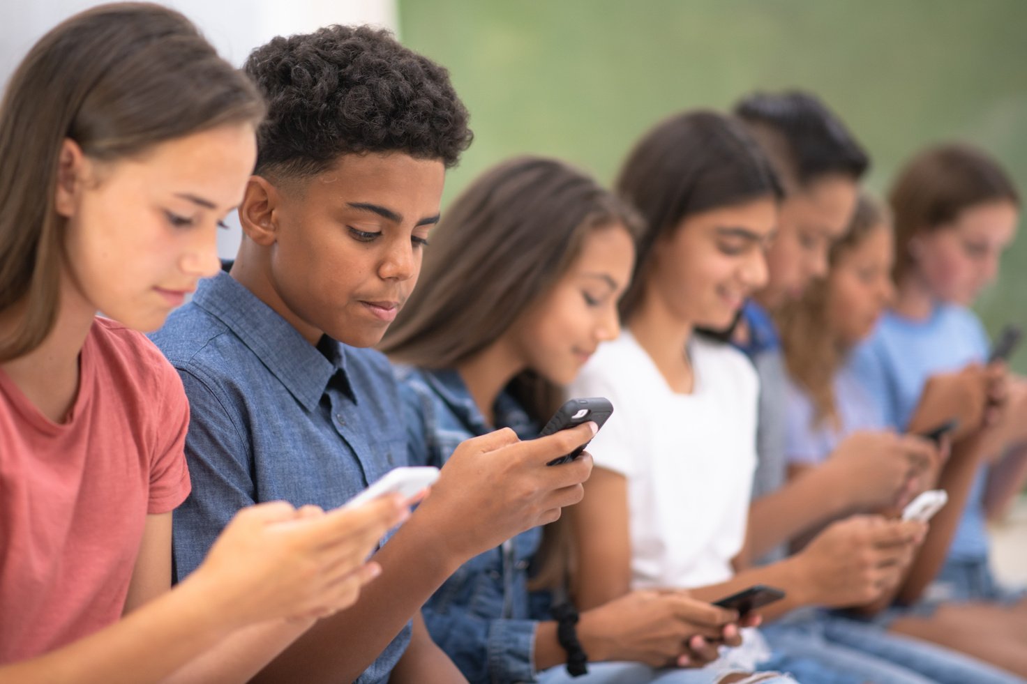 Teens with Cell Phones stock photo